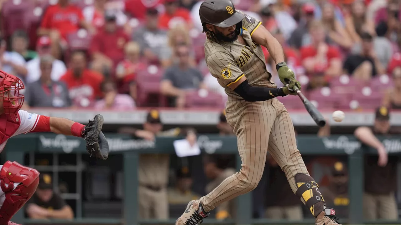 Fernando Tatis Jr. hits a go-ahead double in the 10th inning as the Padres beat the Reds 6-4