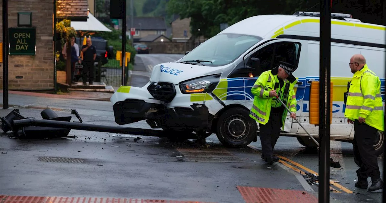 Police van knocks down traffic lights and Golf smashed up in crash