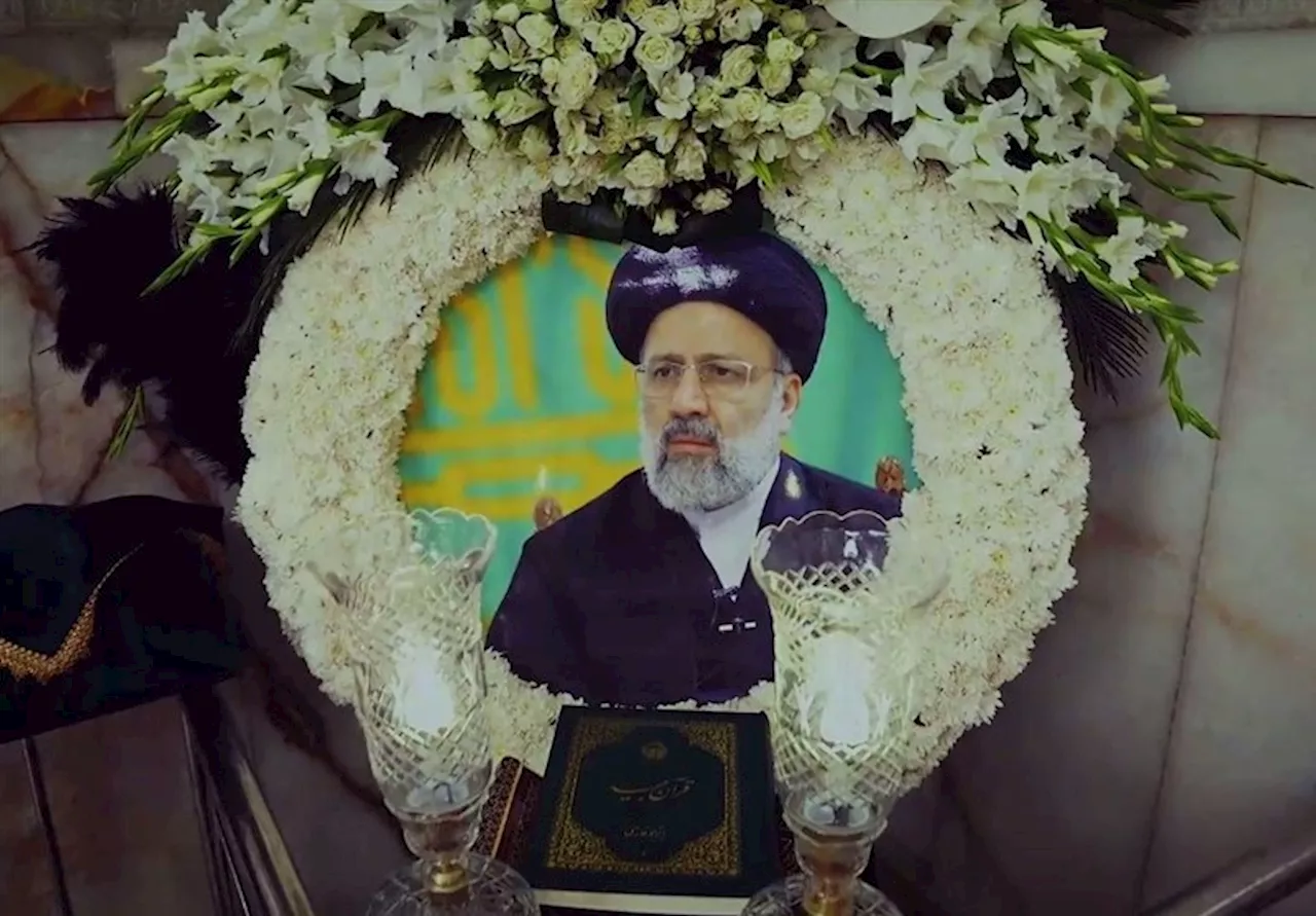 'رئیسی' در آغوش امام رضا (ع) آرام گرفت/ آسمان هم گریست