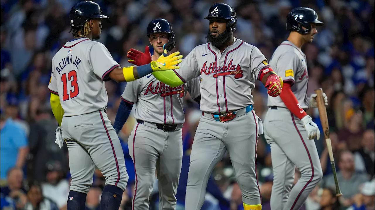 Fried pitches a three-hitter and Ozuna homers to help Braves beat Cubs