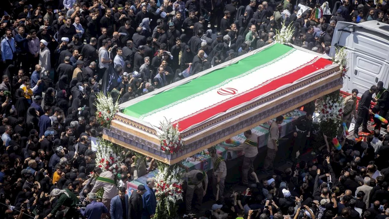 Hundreds of Thousands Gather as Iran Buries Late President Raisi