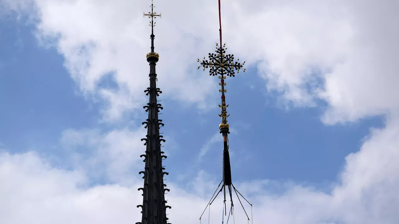 Notre Dame cathedral cross reinstalled in Paris amid restoration efforts