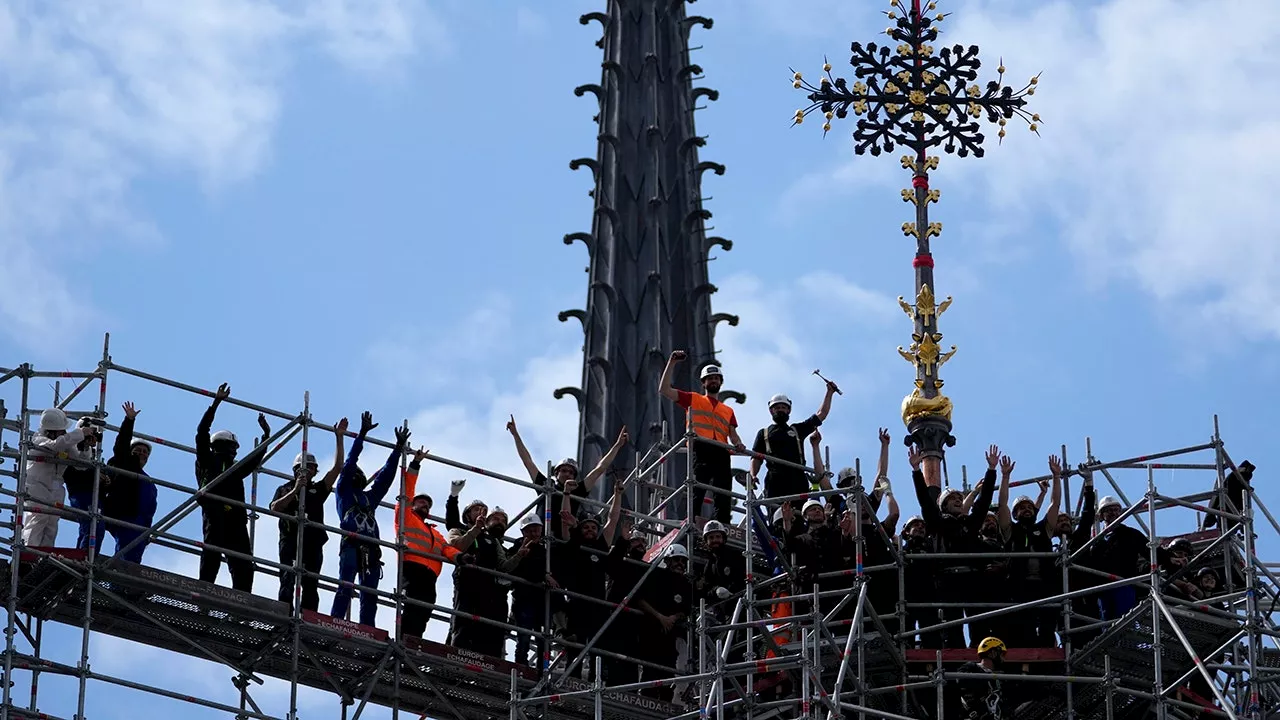 Notre Dame cathedral cross reinstalled in Paris amid restoration efforts