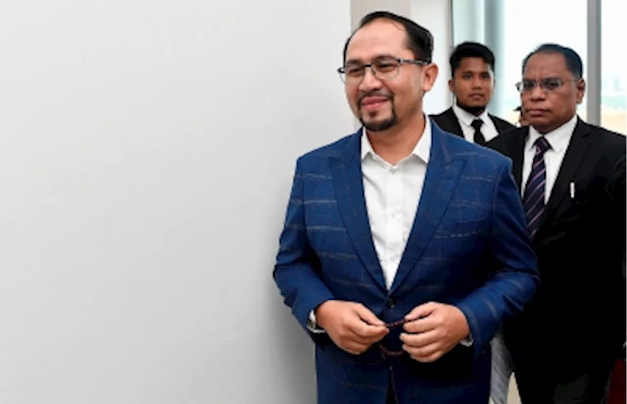 Opposition leader's ex-aide charged again with accepting gratification over PDRM tender