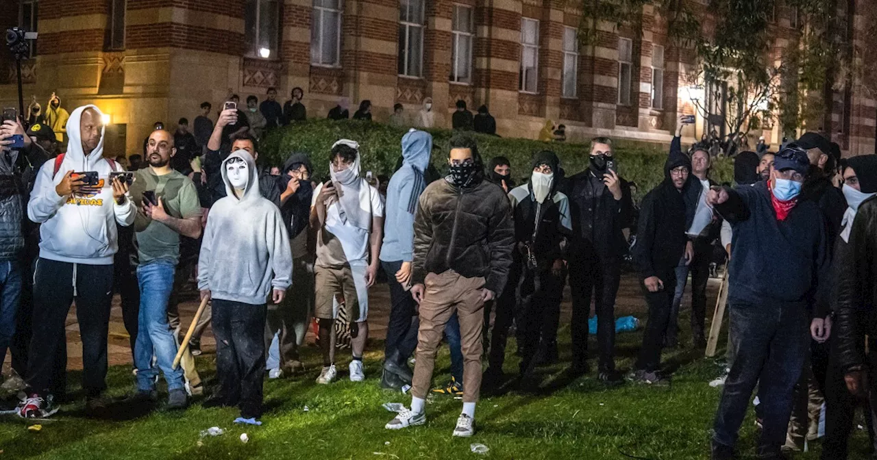 Man seen on video using wooden pole to attack UCLA pro-Palestinian encampment is arrested