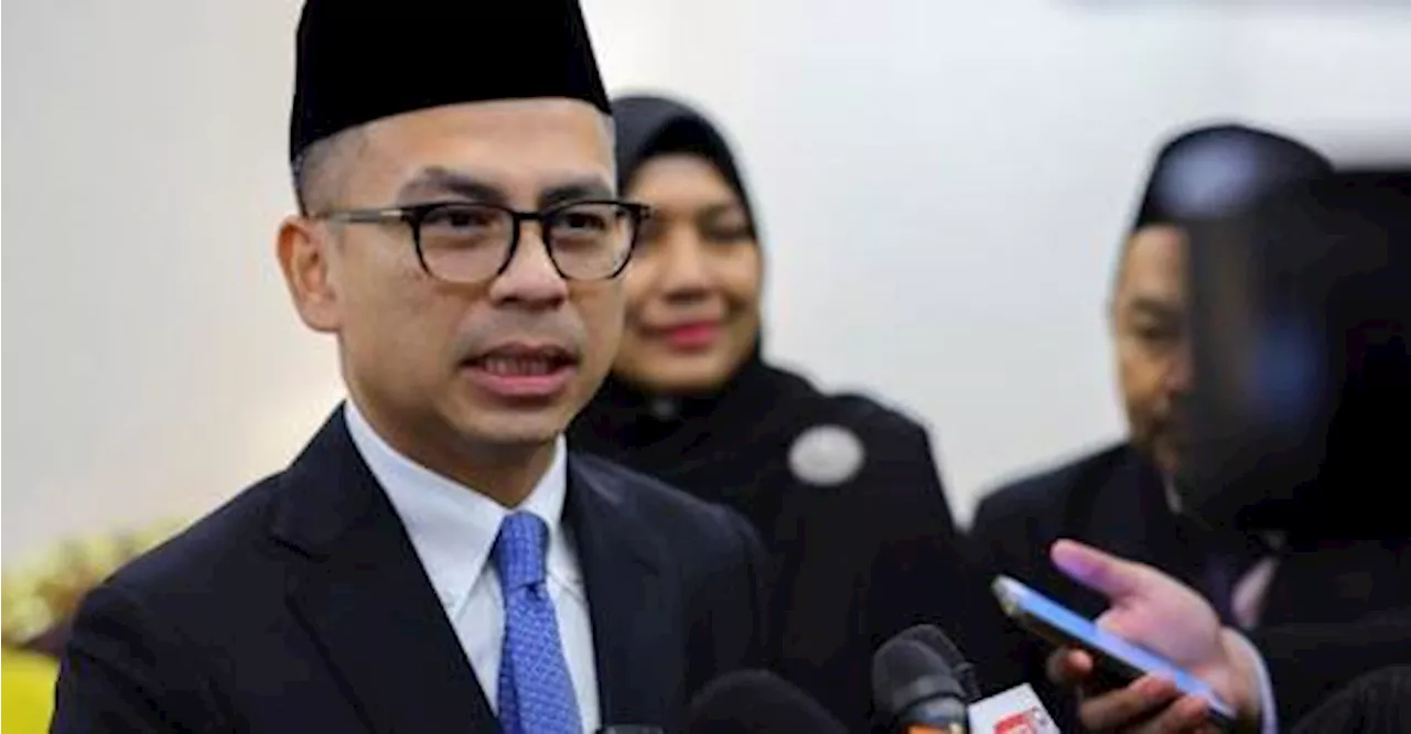 Fahmi condemns threats against journalists, wants swift resolution