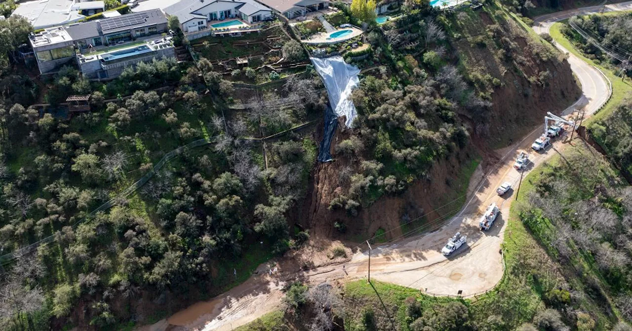 A portion of Mulholland Drive, damaged by mudslides in winter storms, reopens