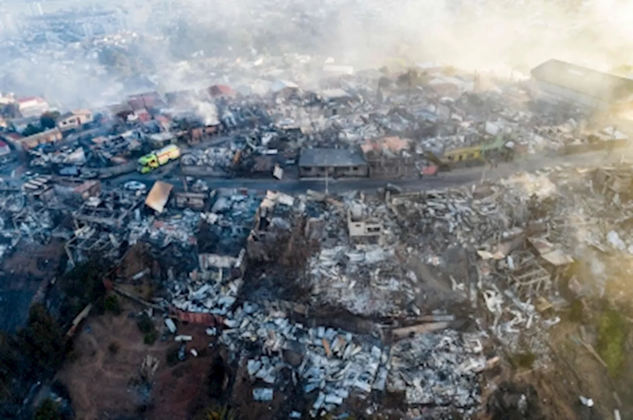 Chile arrests firefighter, official accused in blaze that killed 137