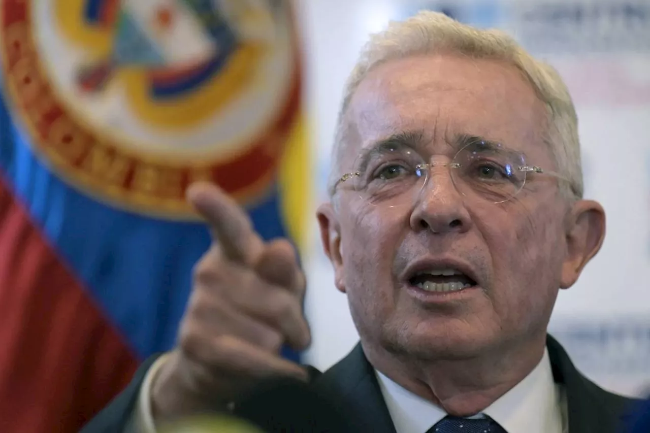 Colombia prosecutors charge ex-president Uribe with witness tampering