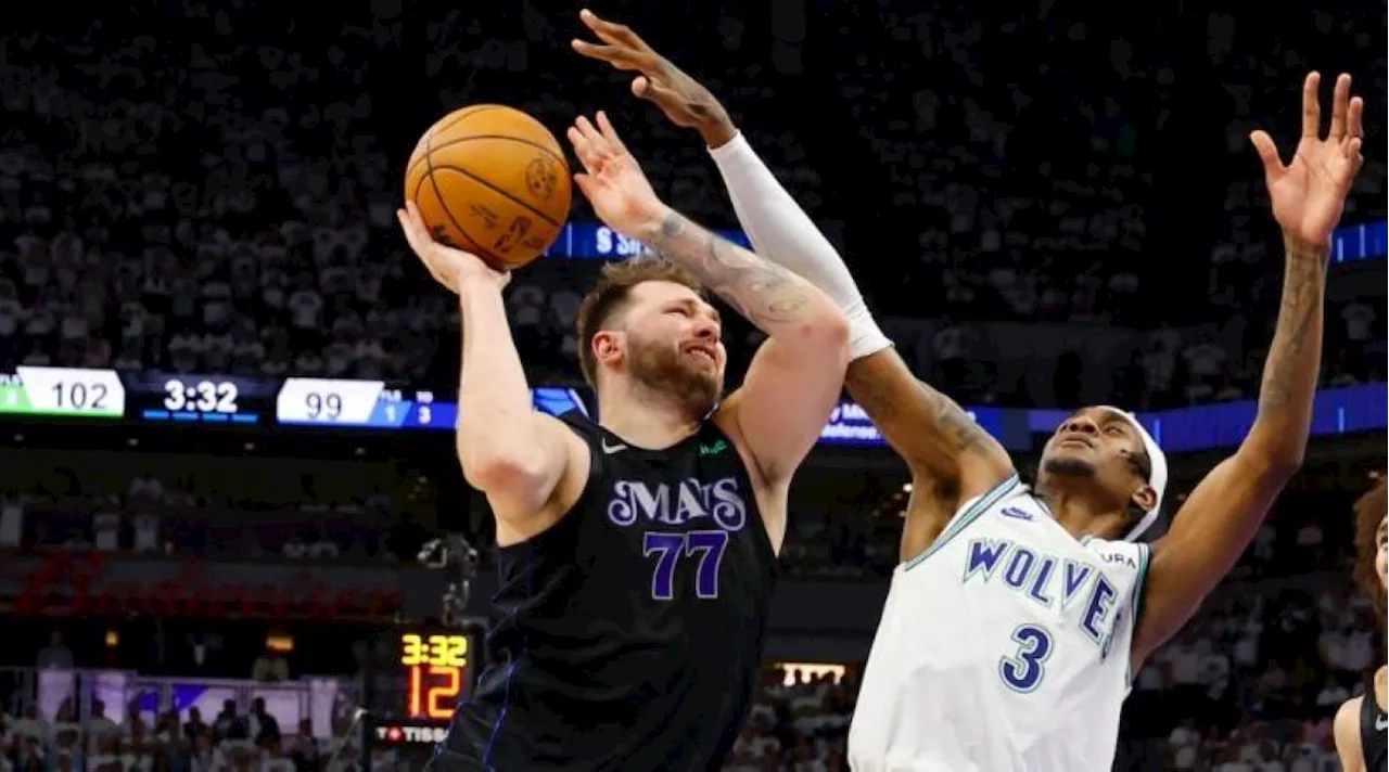 Doncic sizzles as Mavs edge Wolves