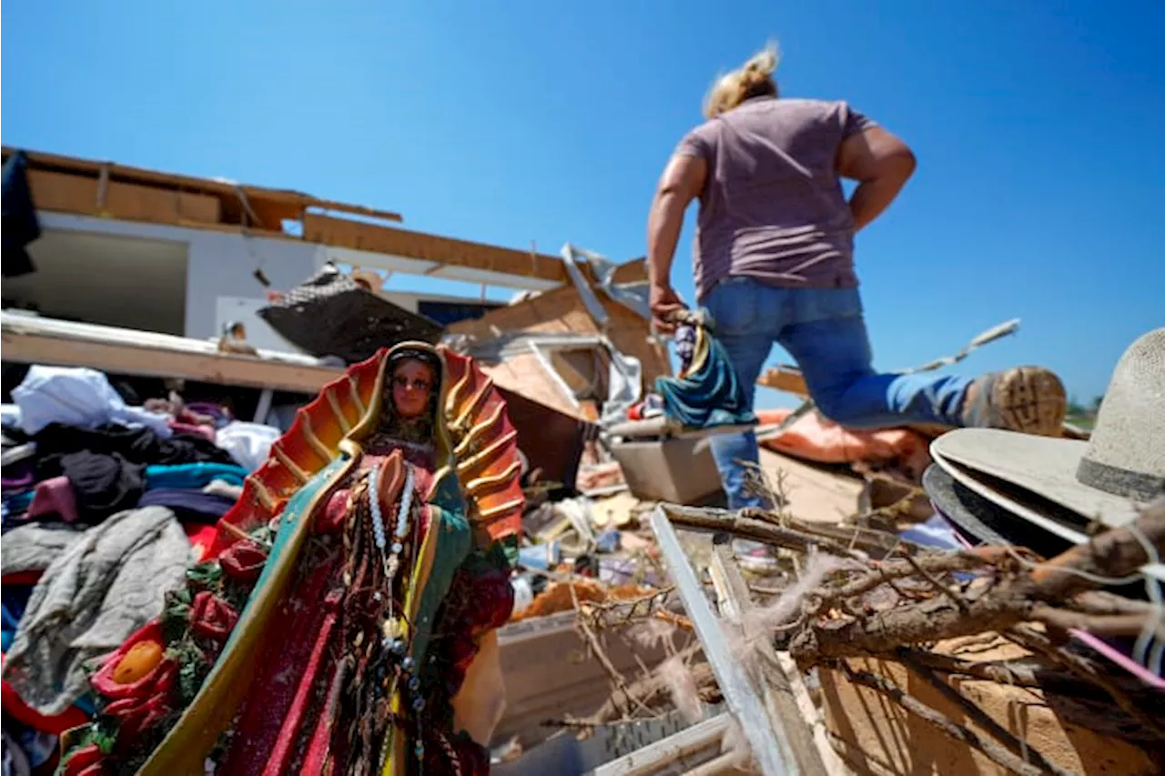 In a north Texas county, dazed residents sift through homes mangled by a tornado