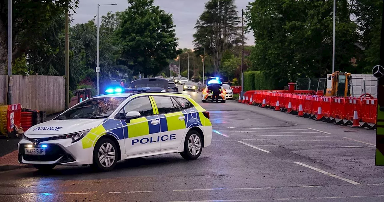 Emergency services at scene of water rescue before man pulled from brook