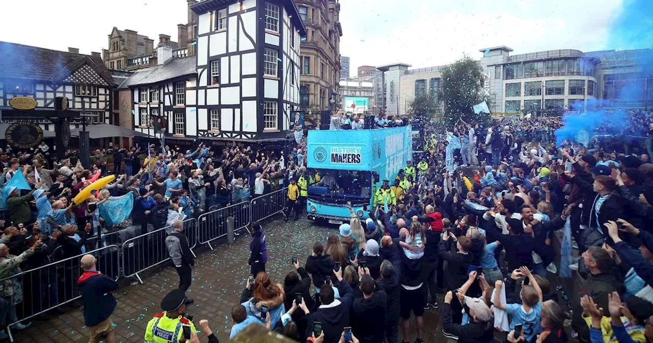 Joyous scenes as thousands of Man City fans flood streets for victory parade