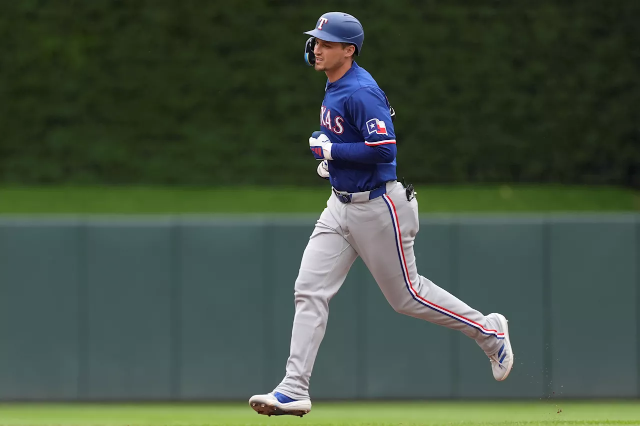 Corey Seager homers twice as the Rangers beat the Twins