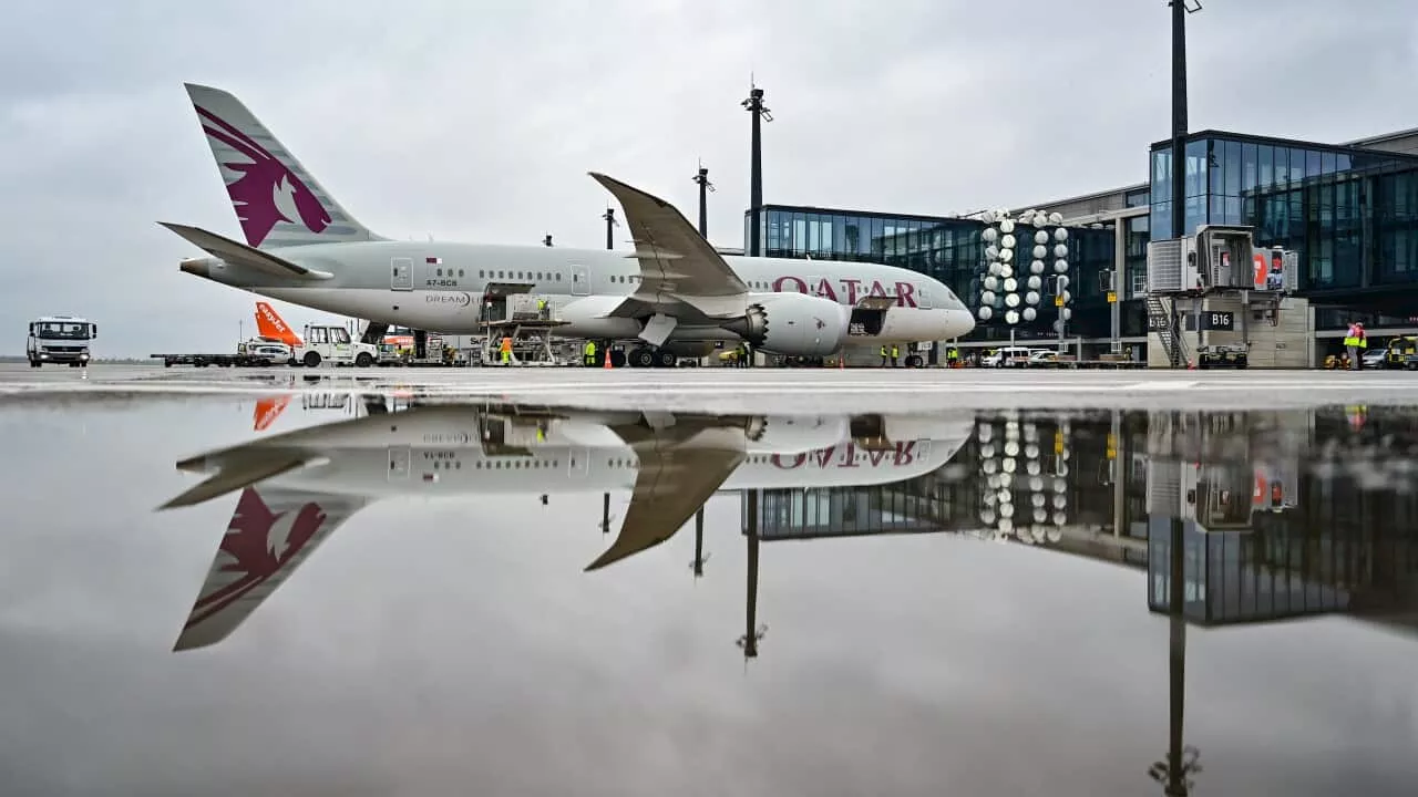 Twelve people injured after Qatar Airways plane hits turbulence