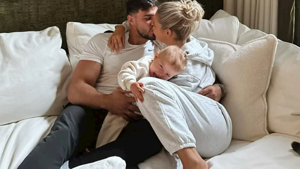 Molly-Mae Hague hits out at split rumours with Tommy Fury as she kisses fiance after weeks apart...