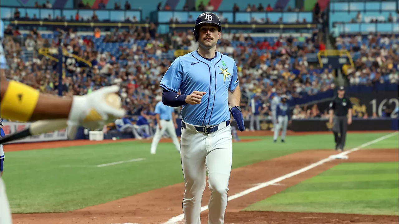 Lowe hits a three-run triple as Rays stop Royals' eight-game win streak