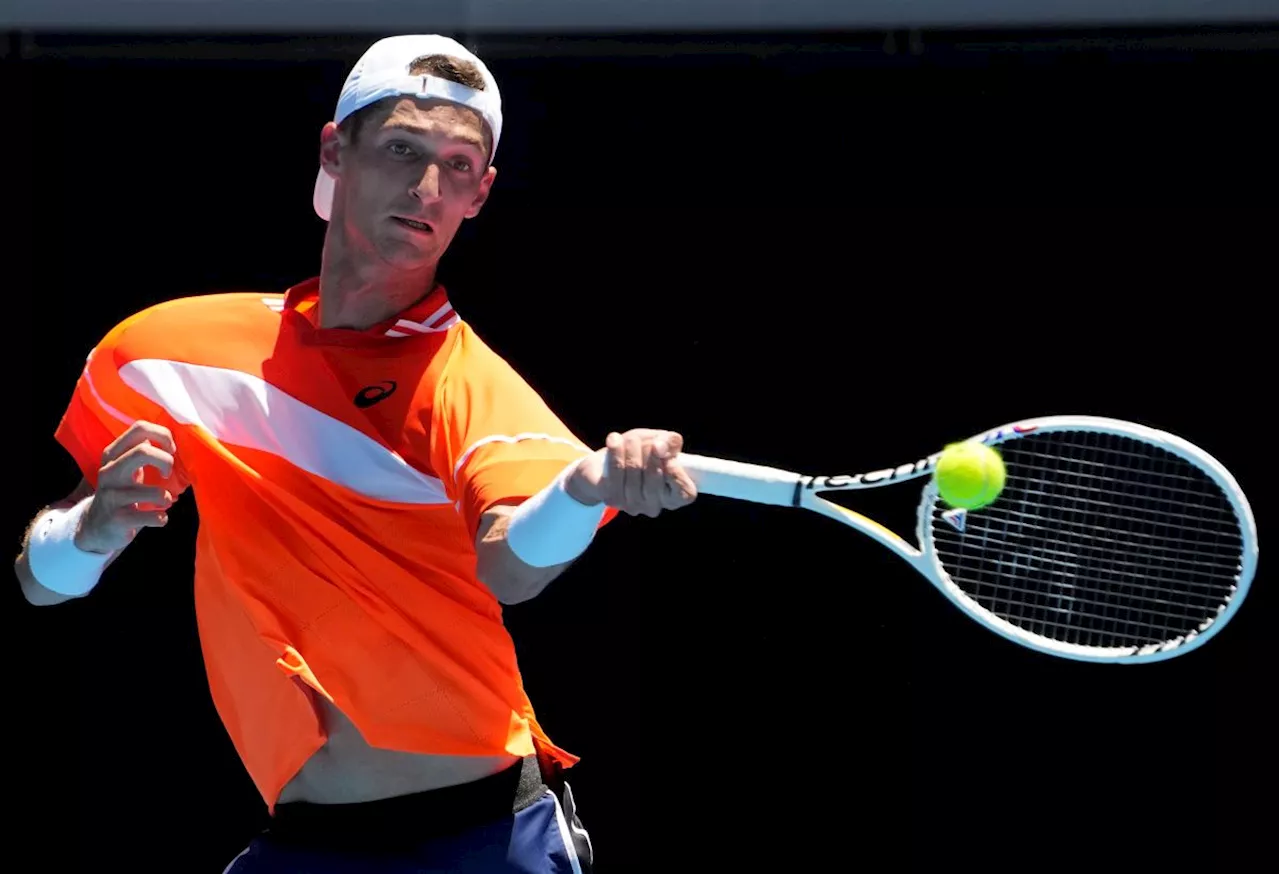 A French player at French Open gets only a warning when his ball strikes fan