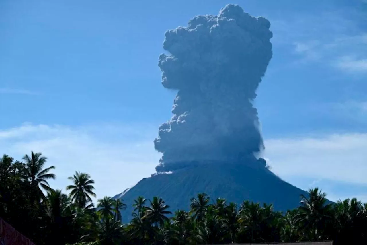 Indonesia’s Mount Ibu erupts again, spews hot ash and sand