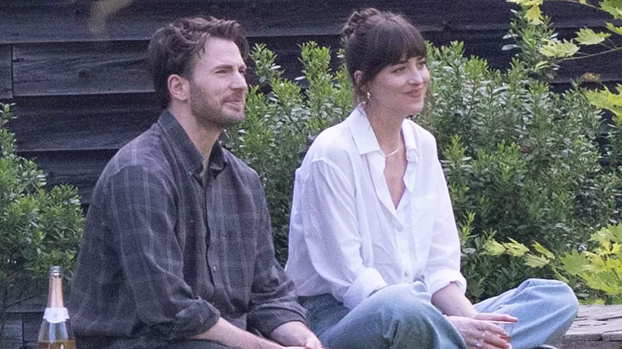 Dakota Johnson shares a bottle of wine with Chris Evans while shooting The Materialists... after she...