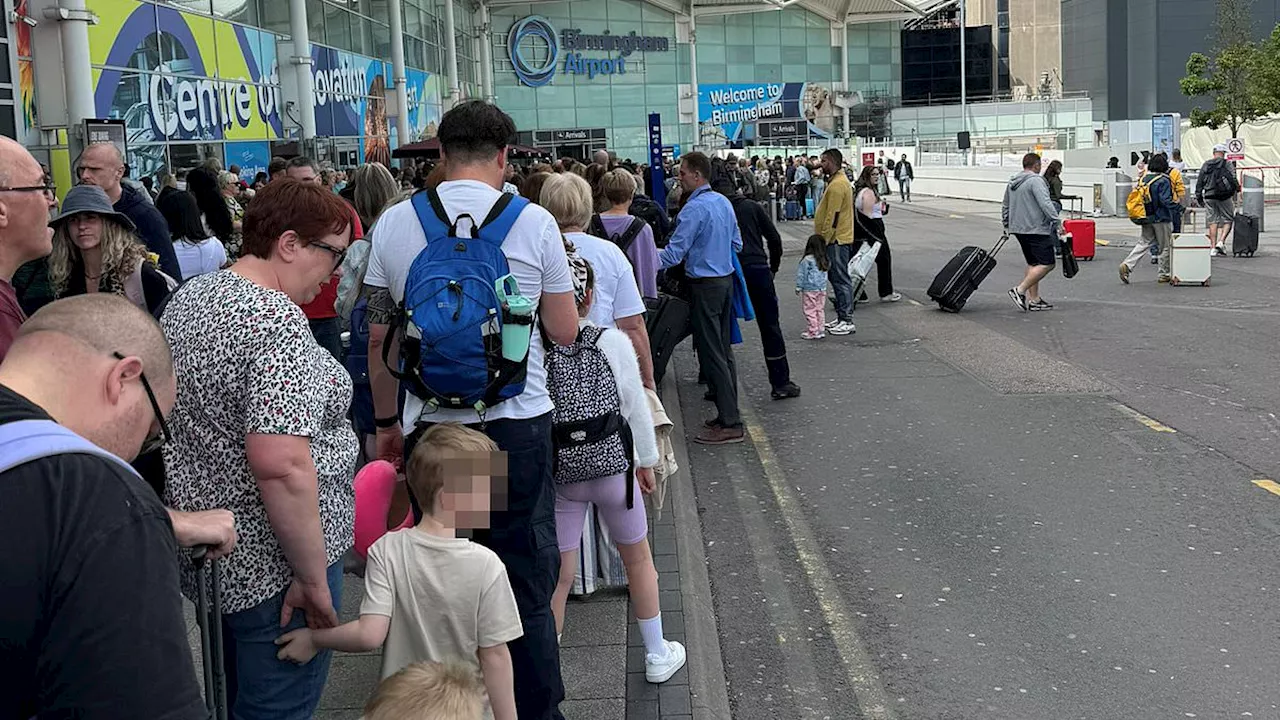 Bank Holiday chaos at Birmingham Airport with holidaymakers forced to queue for hours to get through...