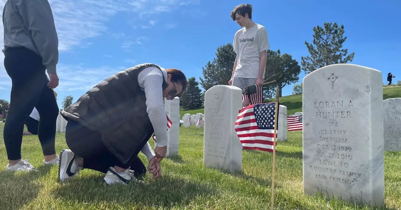 Nonprofit places thousands of flags at Fort Logan National Cemetery on Memorial Day weekend