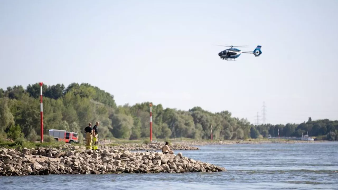 Notfälle: Menschen von Strömung im Rhein mitgerissen: Mann vermisst