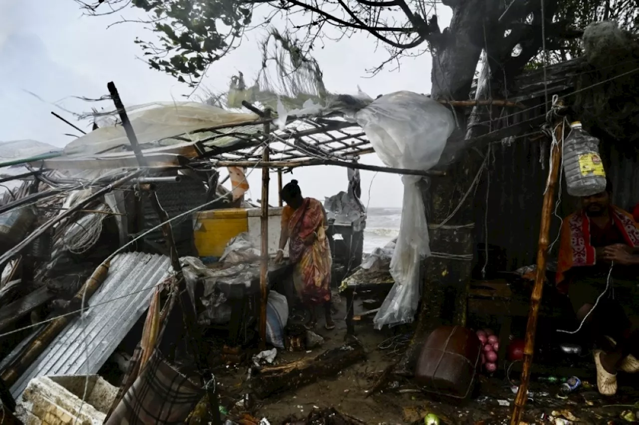 Cyclone whips Bangladesh, India; death toll up