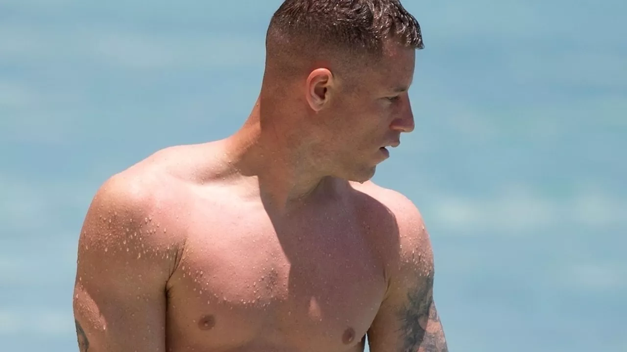 Luton ace Ross Barkley flaunts shredded abs on sunny Barbados beach with girlfriend Katherine Pilkington...