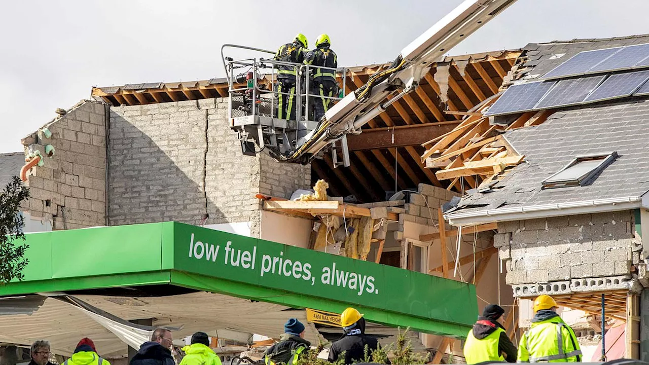 Man and woman are arrested over Irish petrol station explosion which seriously injured nine people...