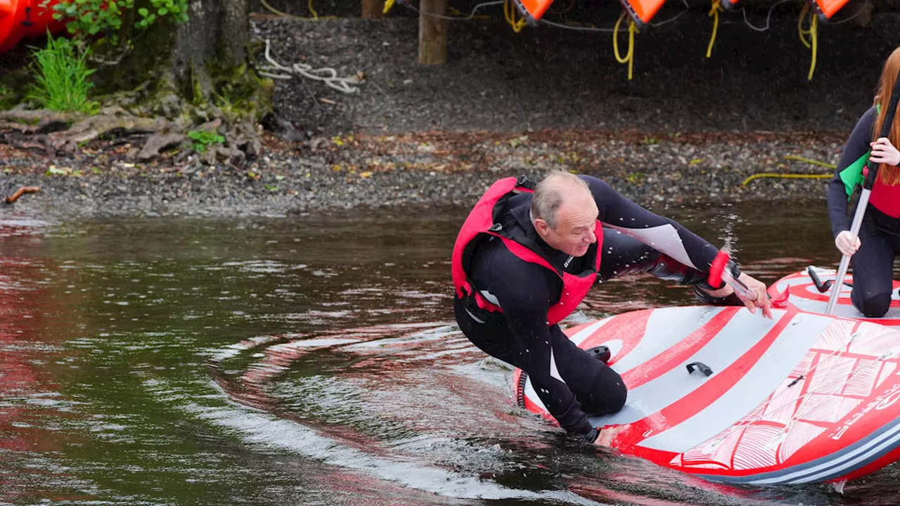 Sir Ed Davey falls into Windermere on purpose during election campaign stunt highlighting sewage pollution