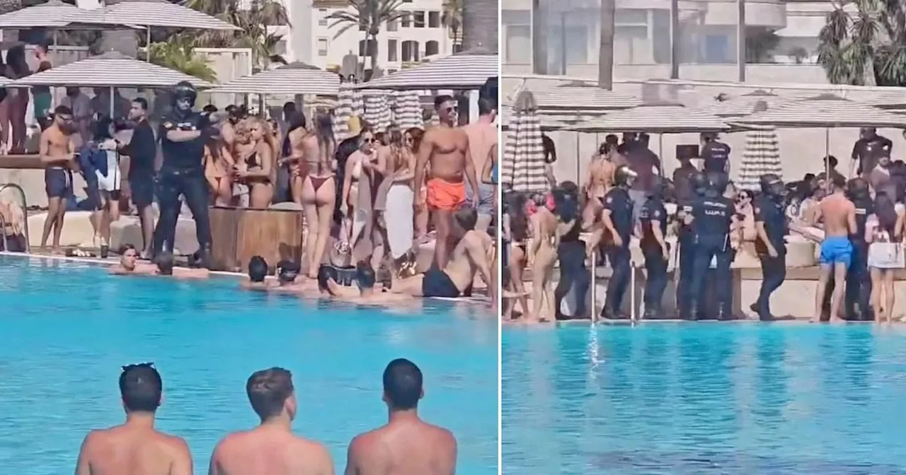 Armed police storm Marbella beach club packed with British tourists