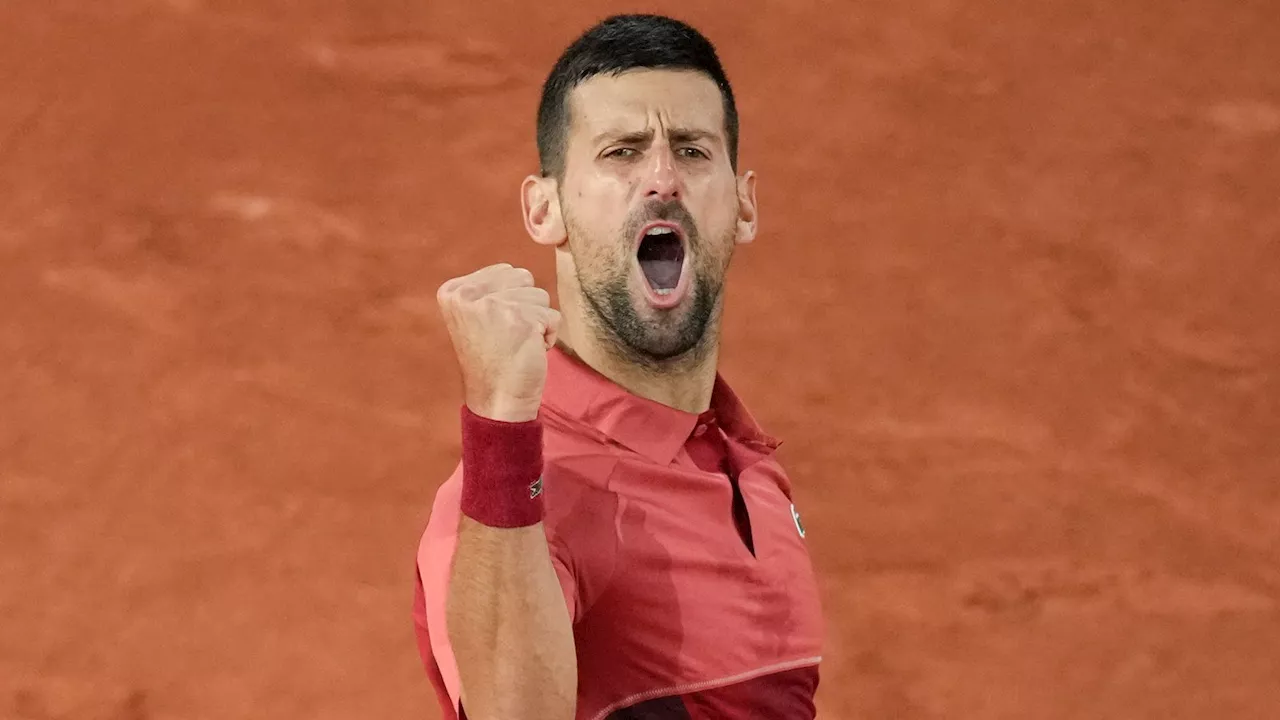 Novak Djokovic: Defending French Open champion up and running with victory over Pierre-Hugues Herbert