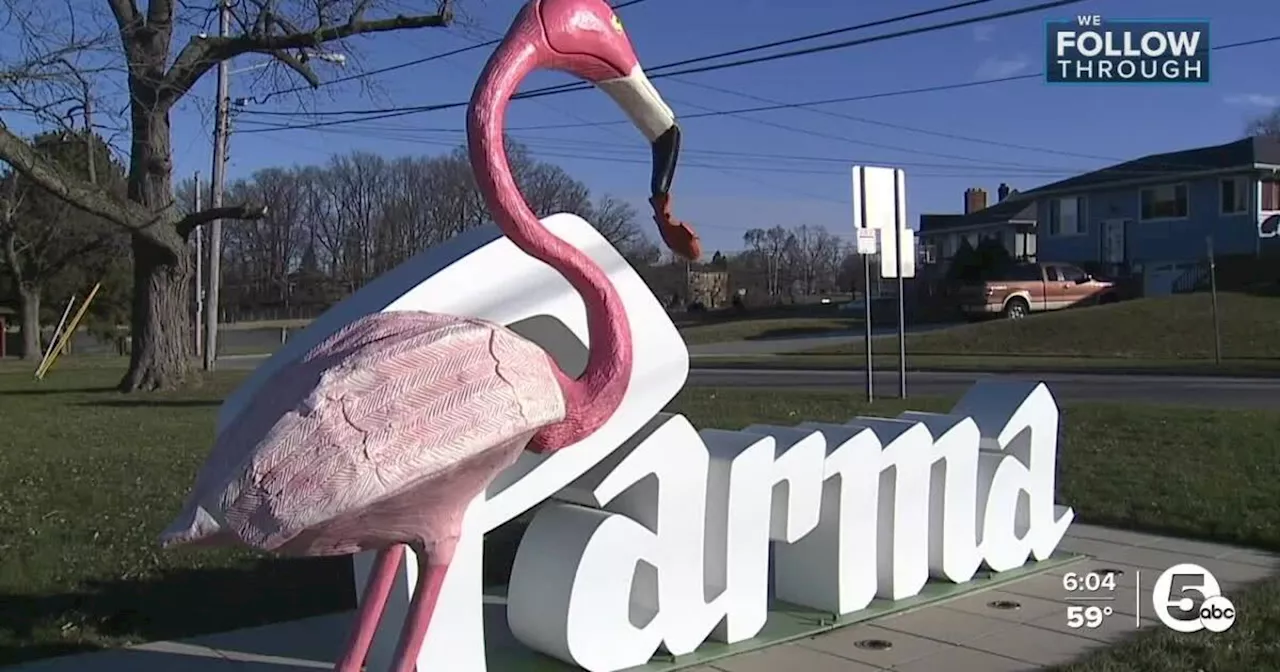 Parma script sign flamingo found damaged after removed from location