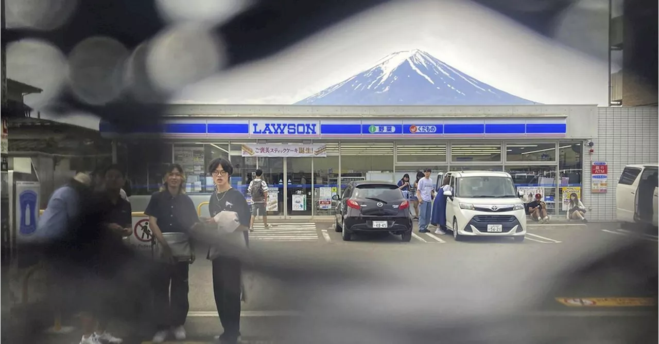 Several holes discovered in screen set up to block tourist photos of Mount Fuji