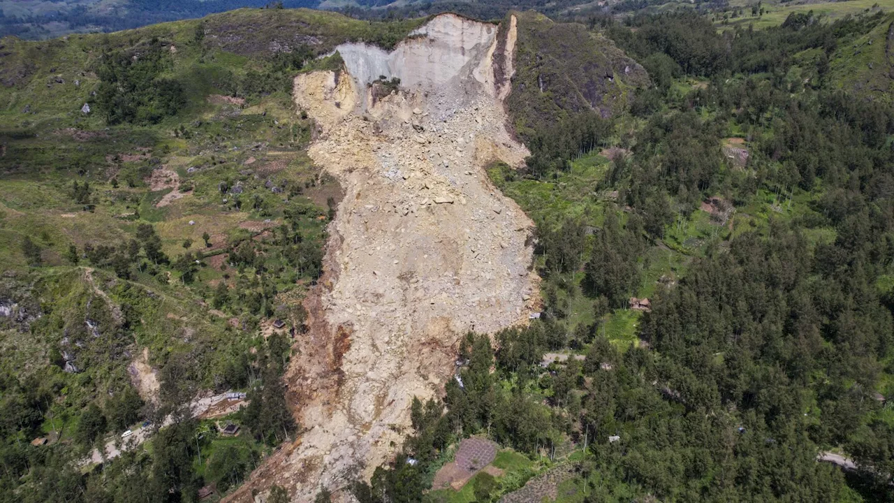 Authorities in Papua New Guinea search for safer ground for thousands of landslide survivors