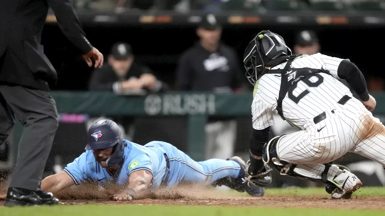 Schneider, Gausman lead Blue Jays past sliding White Sox, 7-2.