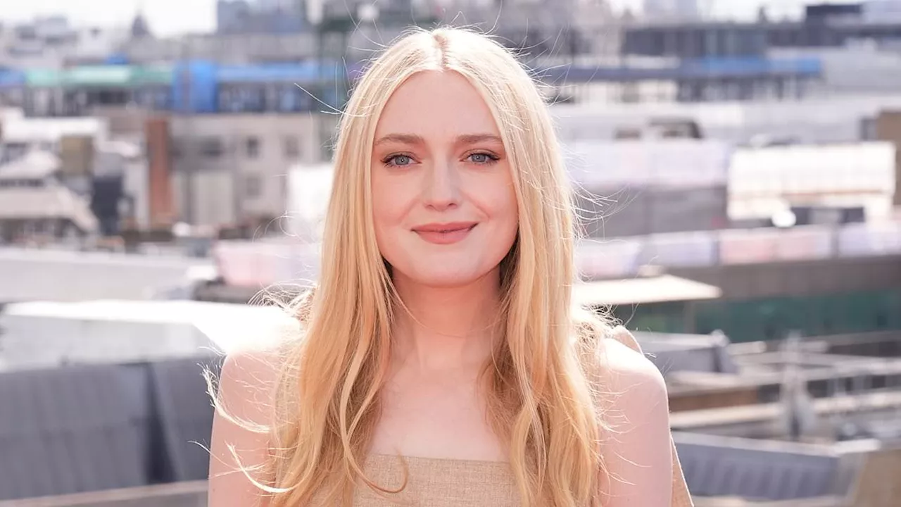 Dakota Fanning wears chic belted floral dress as she attends a photocall for The Watched on the roof...