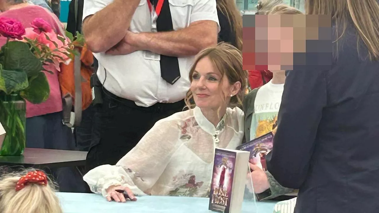 Geri Horner greets children at the Hay Festival as Spice Girl makes her FIRST public appearance...