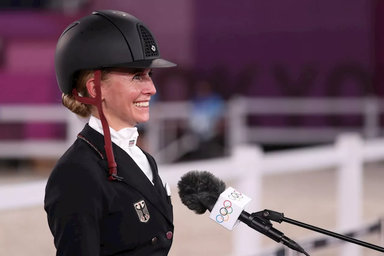 Reiter schlafen bei Lidl statt im Olympischen Dorf