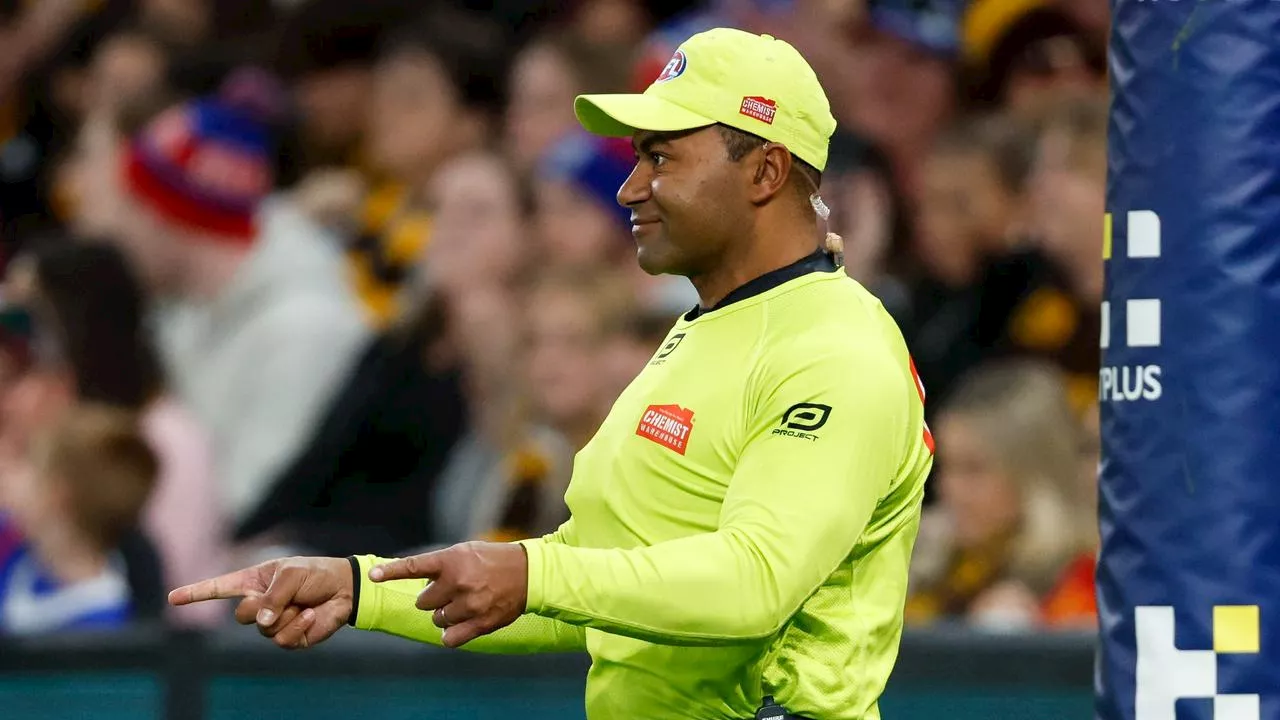 ‘Risk to the game’: AFL coach’s fears over in-ear ‘umpire coach’ — and what the umps really hear