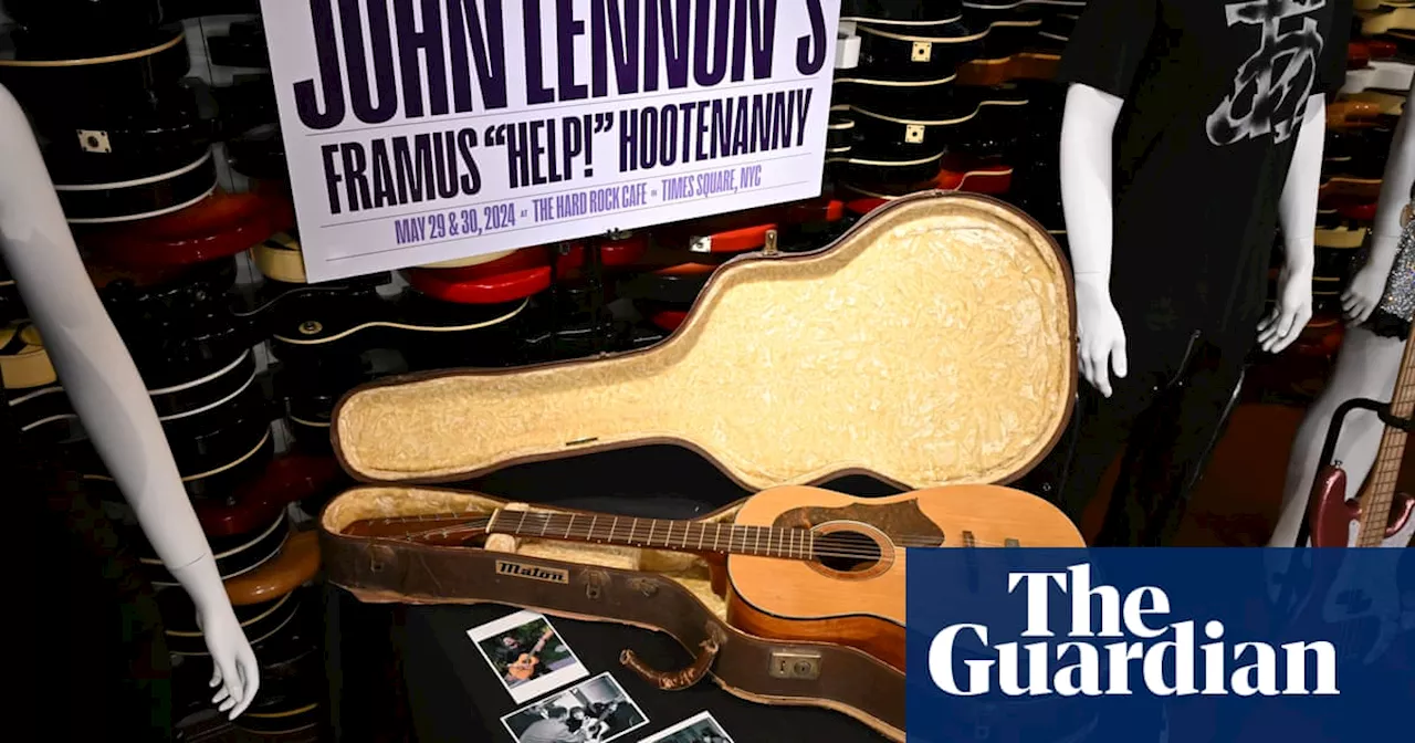 John Lennon guitar sells for $2.9m, breaking Beatles auction record