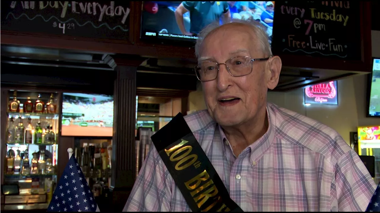 WWII vet, Toledo business owner celebrates 100th birthday