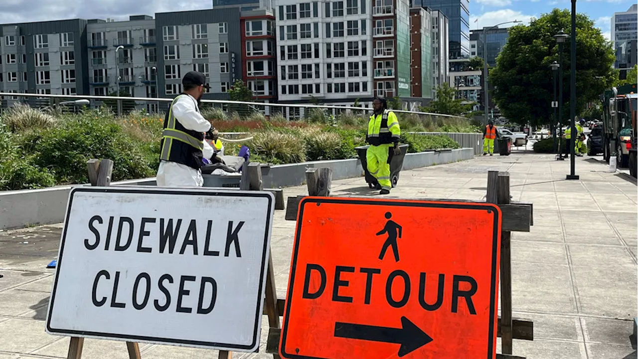 Encampment on sidewalk between South Lake Union and Seattle Center cleared