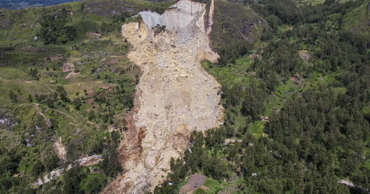 Authorities in Papua New Guinea search for safer ground for thousands of landslide survivors