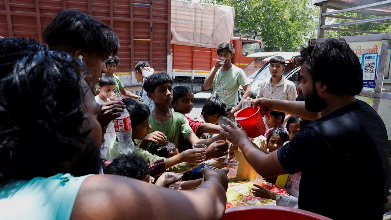 India: New Delhi heatwave declared 'severe' as record-breaking temperatures cause children to faint