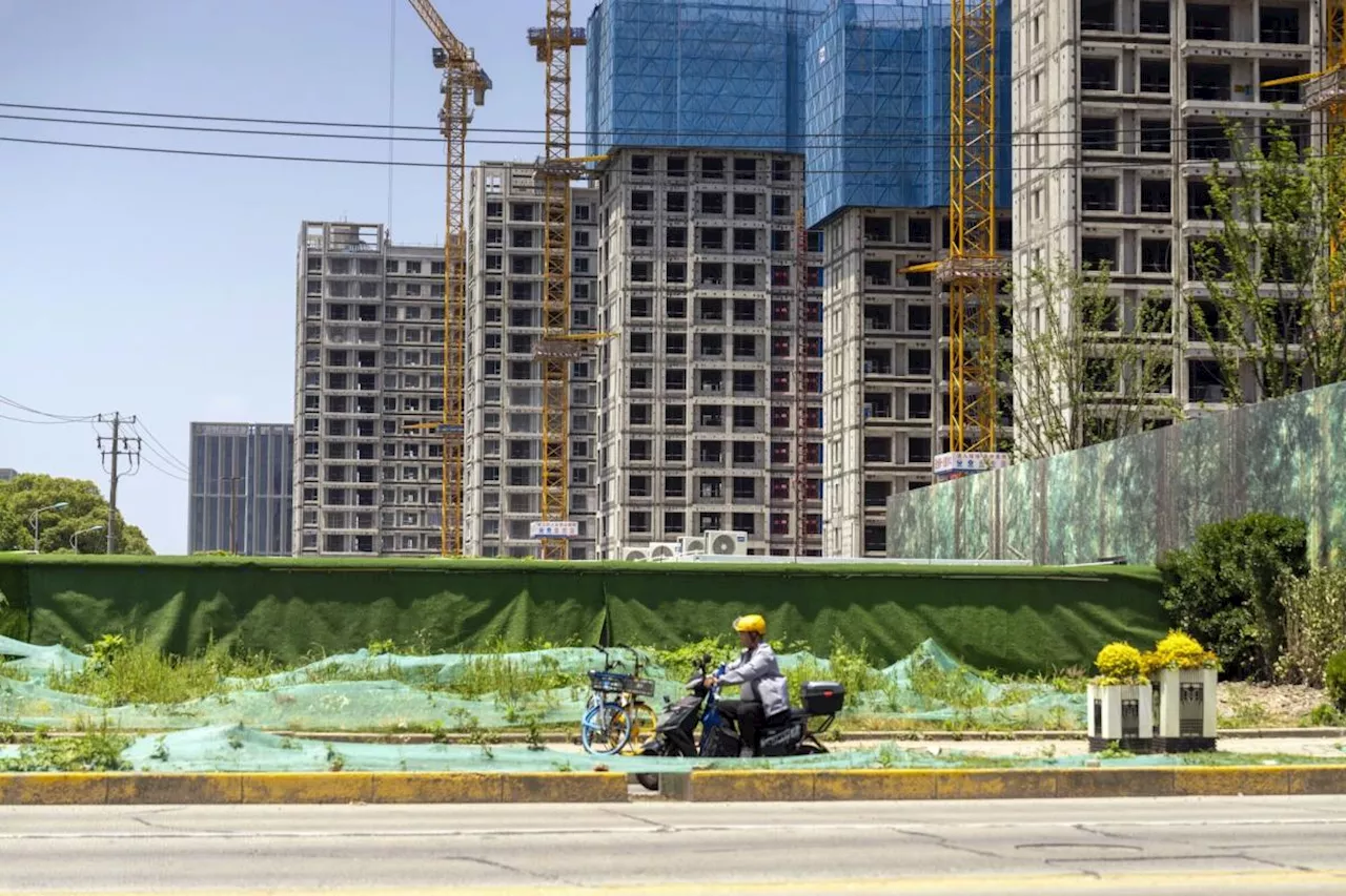 Chinese Mega Cities Loosen Homebuying Rules as Aid Spreads