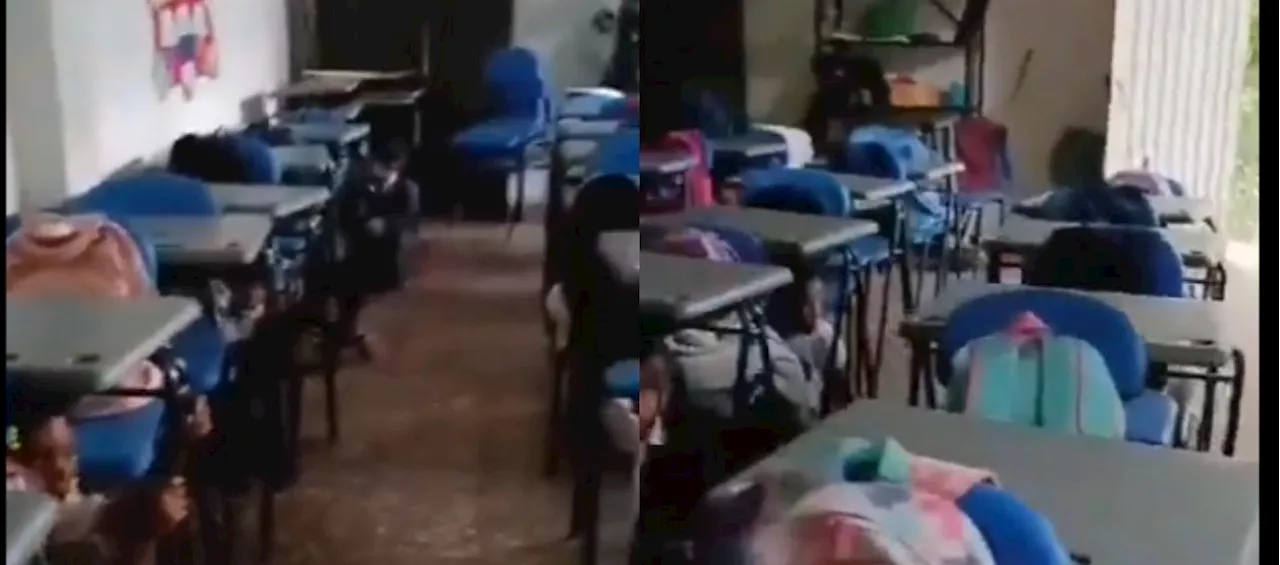 Niños de colegio cantan alabanzas y se resguardan mientras se escuchan disparos en el Cauca