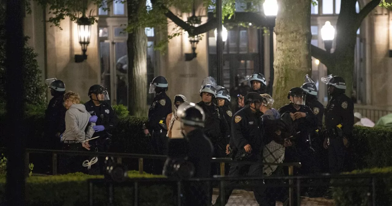 Police officer fired gun while clearing protesters from Columbia building, prosecutors say