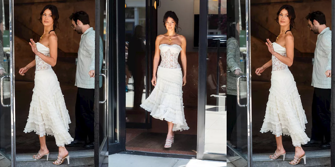 Bella Hadid Glows in a Strapless Lace Dress With a Sheer Corseted Bodice